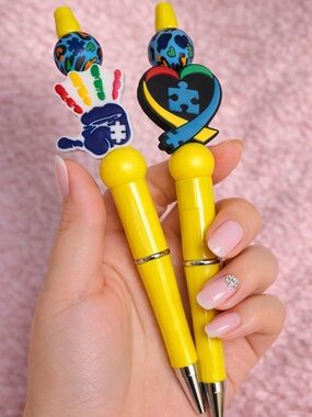 Yellow autistic Pens with Colorful Puzzle Heart & Hand Toppers